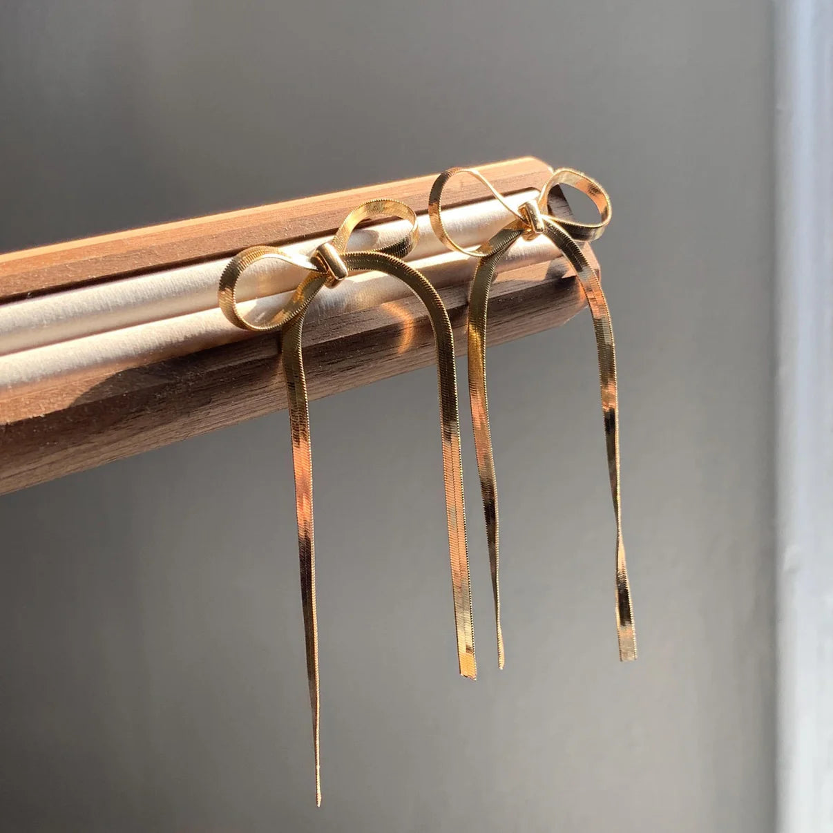 Whisper Bow Long Earrings